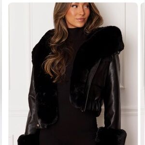 Elegant Black Leather Jacket with Faux Fur